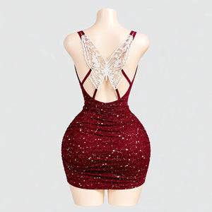 Glitter mini dress with a lace butterfly back

