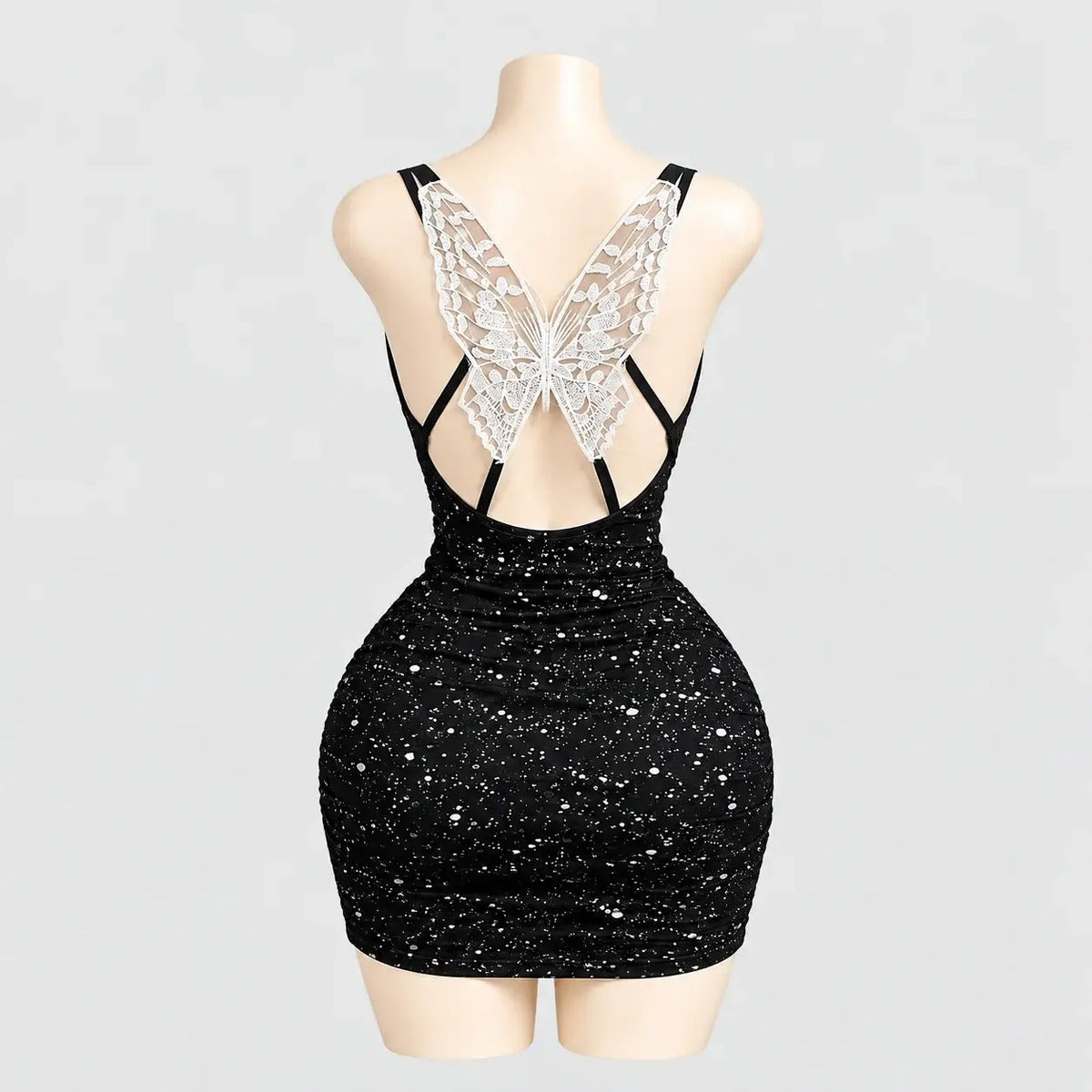 Glitter mini dress with a lace butterfly back
