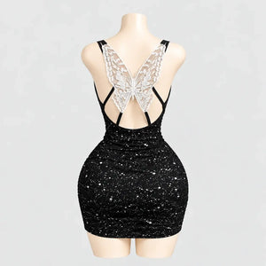 Glitter mini dress with a lace butterfly back
