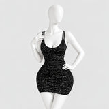 Glitter mini dress with a lace butterfly back
