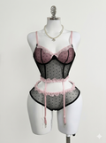 Pink and black polka dot lingerie set with lace.