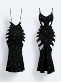 Glittery black maxi dress with cut-out details.